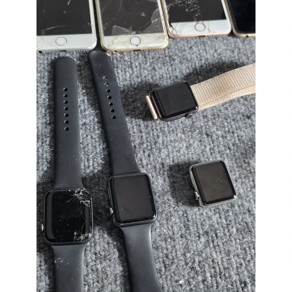 Lot Of 4 Apple Watches And 4 Iphones And Ipod Nano And Fitbit